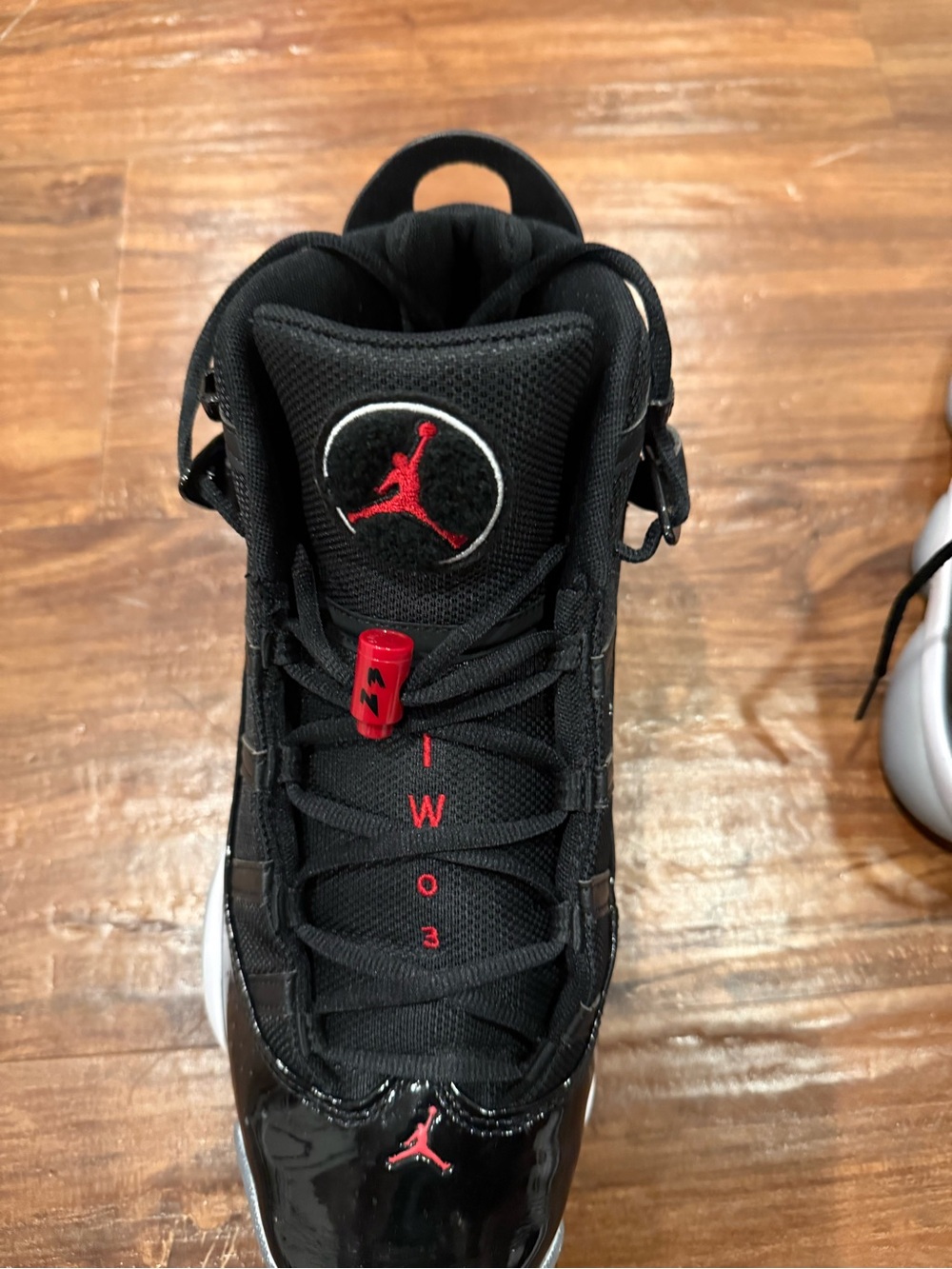 Jordan Men’s Black and Red Retro Basketball Sneakers - Picture 8 of 8